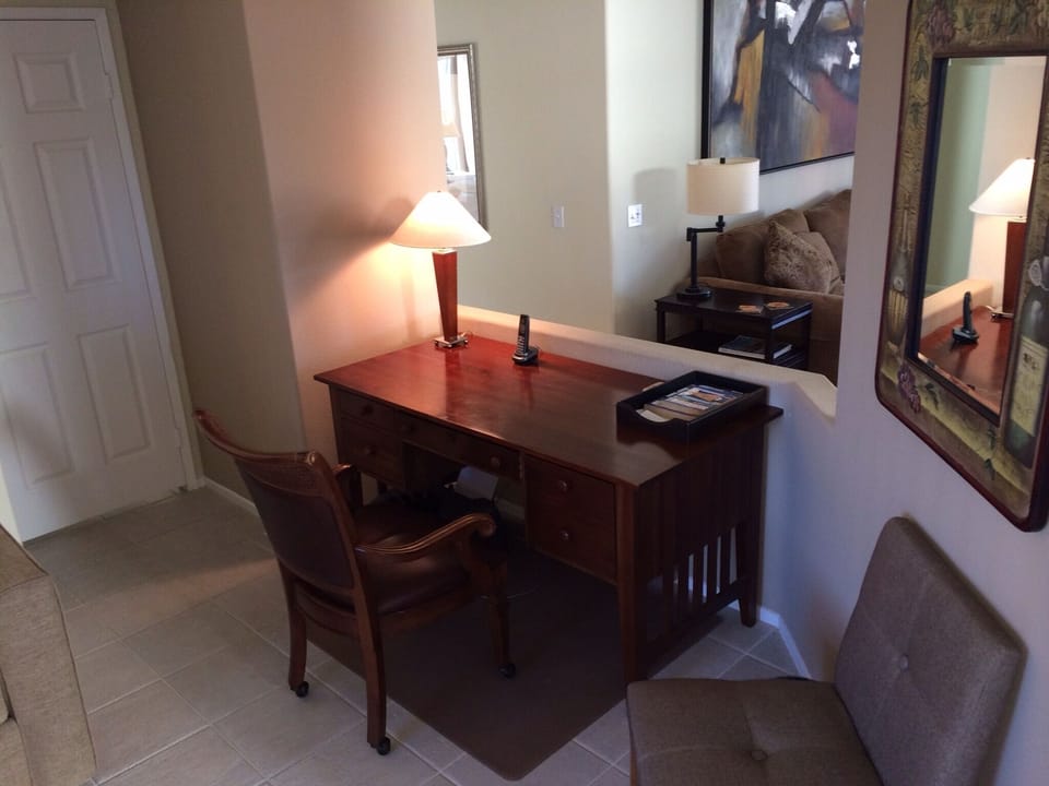 Practical work station/desk in the den.  Wireless throughout the property.