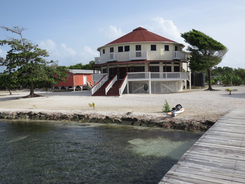 This beautiful home sits of 12 acres of oceanfront property on Calabash Caye.