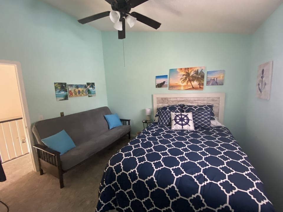 Upstairs bedroom with futon that folds into full size bed w/coil spring mattress