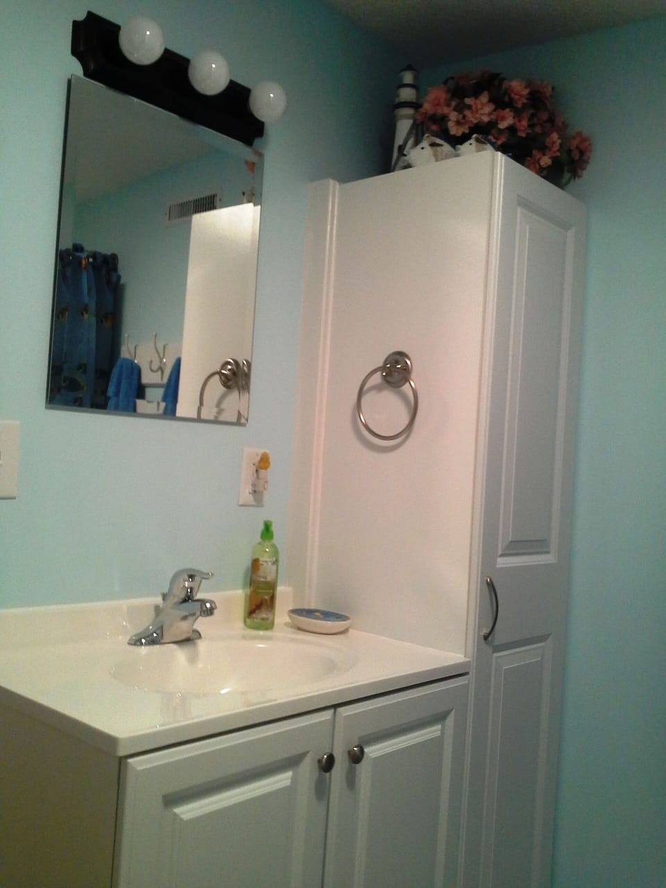 Downstairs Bathroom off bedroom #4, sink view.