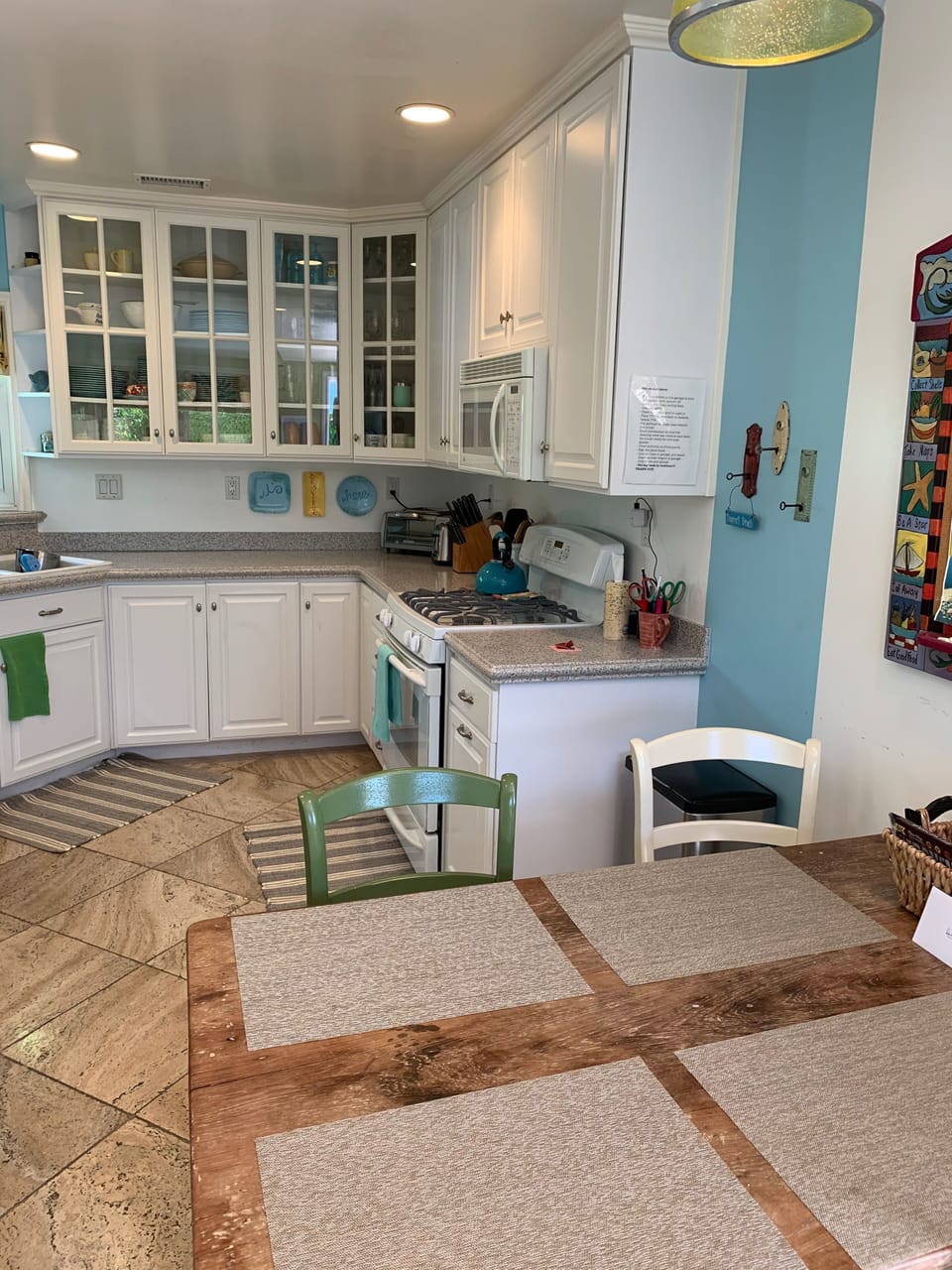 Kitchen amenities include refrigerator, oven, stove, microwave, and coffeemaker