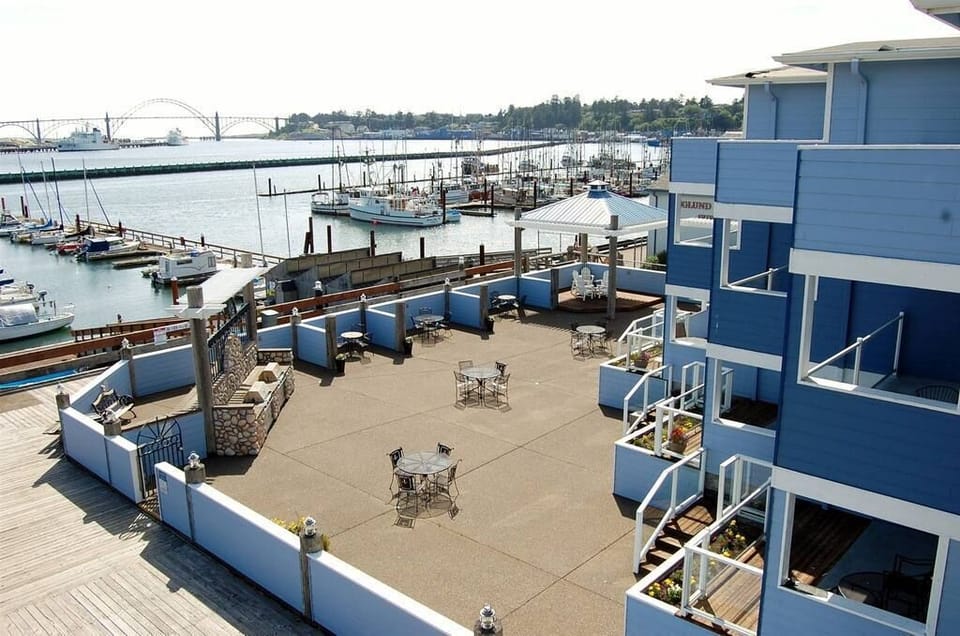 Large patio with crab cookers and BBQ grills

