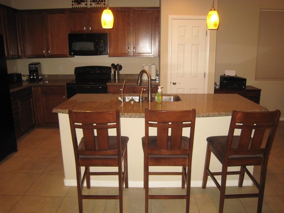 Another three can eat at the Kitchen Island