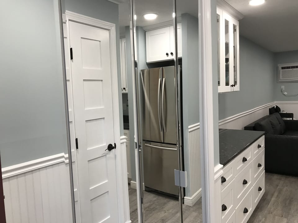 Linen closet with with sheets , blankets, and pillows