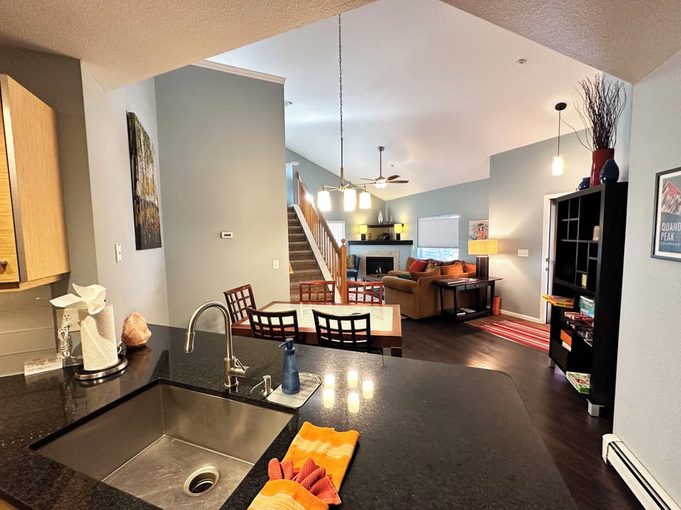 Open floor plan from kitchen to dining to livingspace, and then onto the deck.