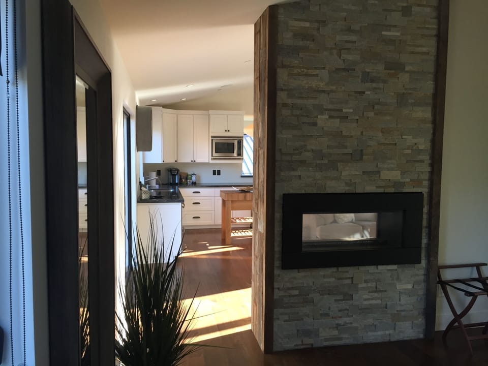 View from bedroom, see through fireplace