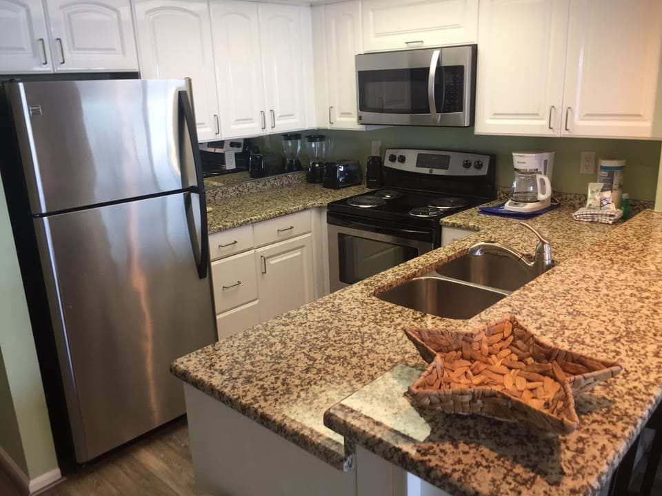 Complete kitchen with coffee maker, blender and more