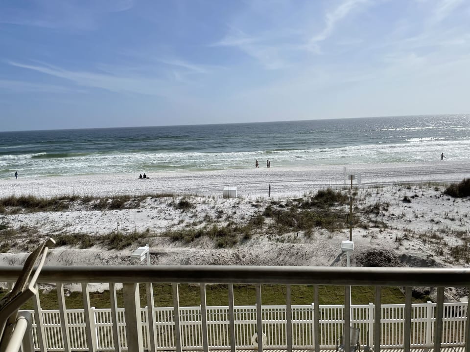 Your view from the livin room.  Corner balcony has the best view of the beach!