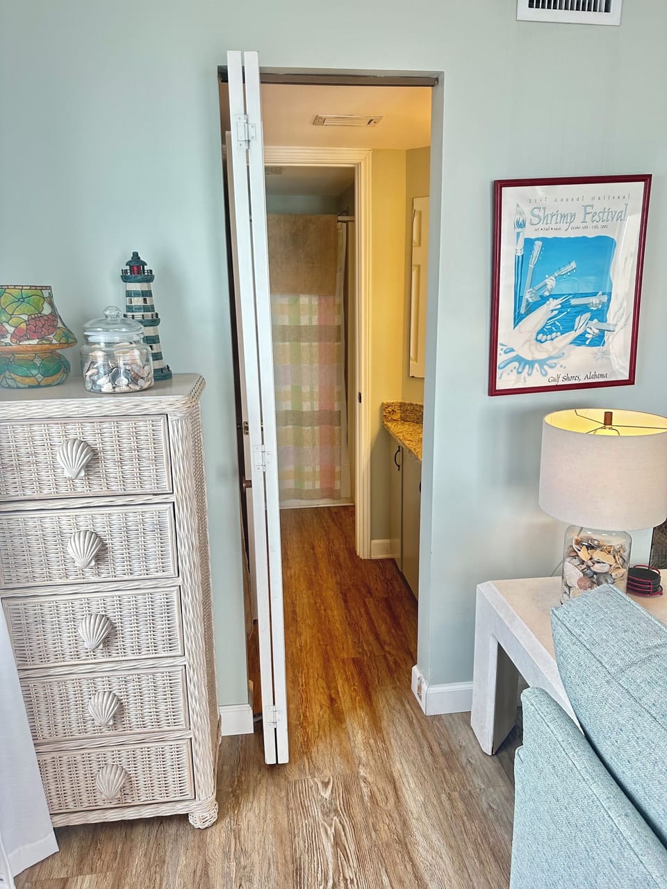 Entry to third bathroom from corner of living area