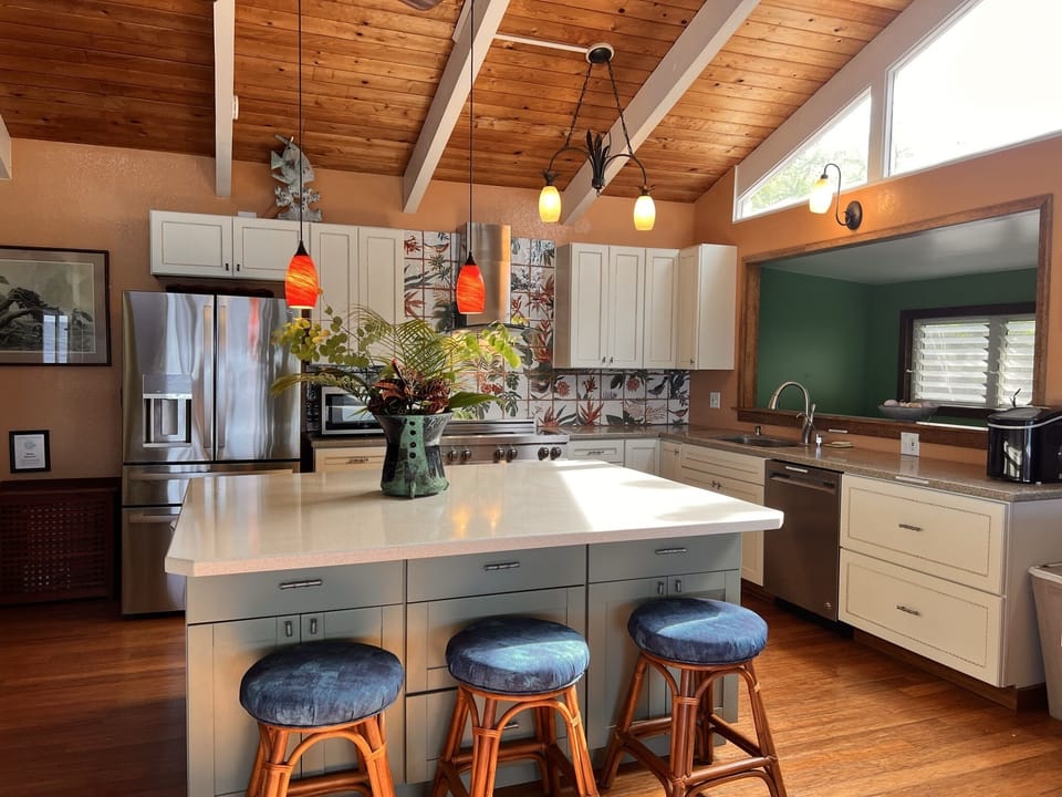 A kitchen for people who love to cook- well stocked with spices & staple foods