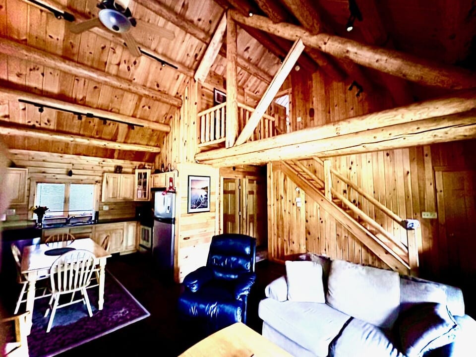 master great room, kitchen stairs to upper loft master bedroom and bath