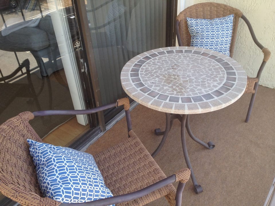 Grab a book or a drink and relax on a private balcony