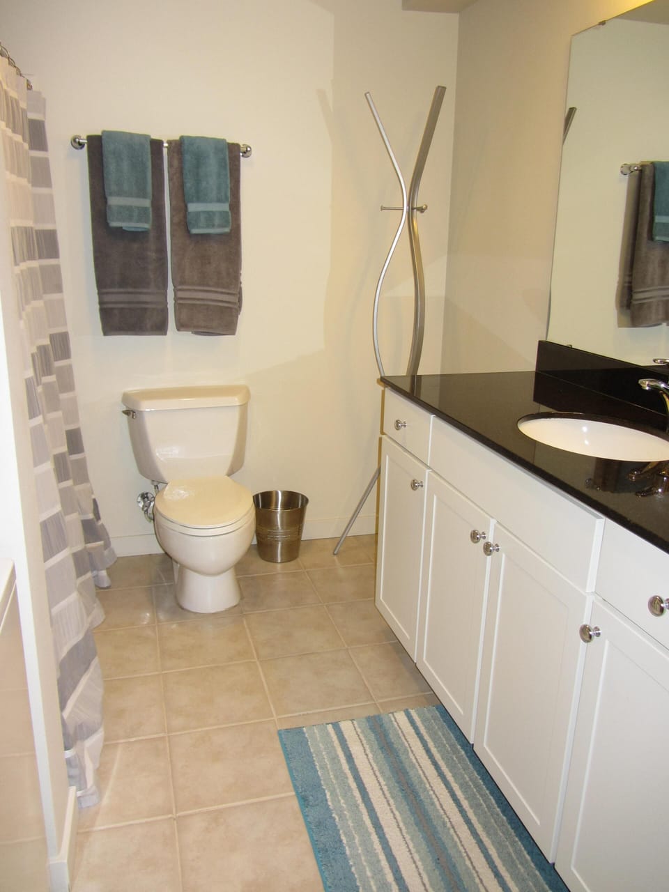 Full bath w/ plenty of counter space - hair dryer, soap & shampoo, conditioner