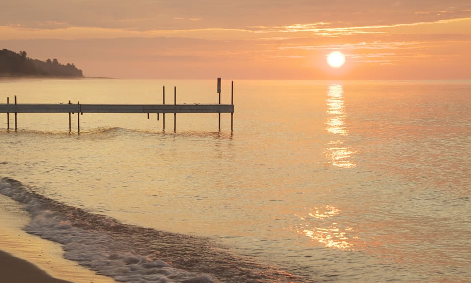 Sunrise view on private beach in front of the house