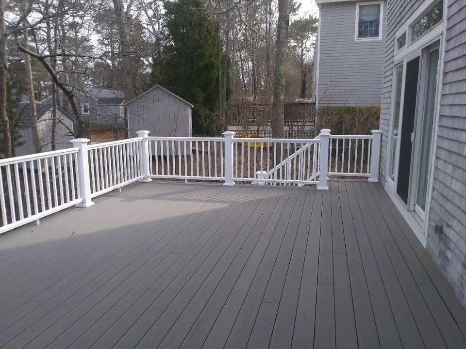 New deck (has gas grill and dining table with 6 chairs and umbrella)