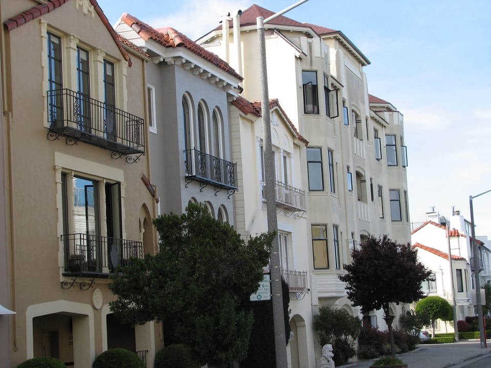 My beautiful  street looking the other direction! Classy Mediterranean and Art Deco buildings abound.