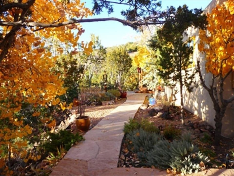 Front path leads to patio, perfect for sunset viewing