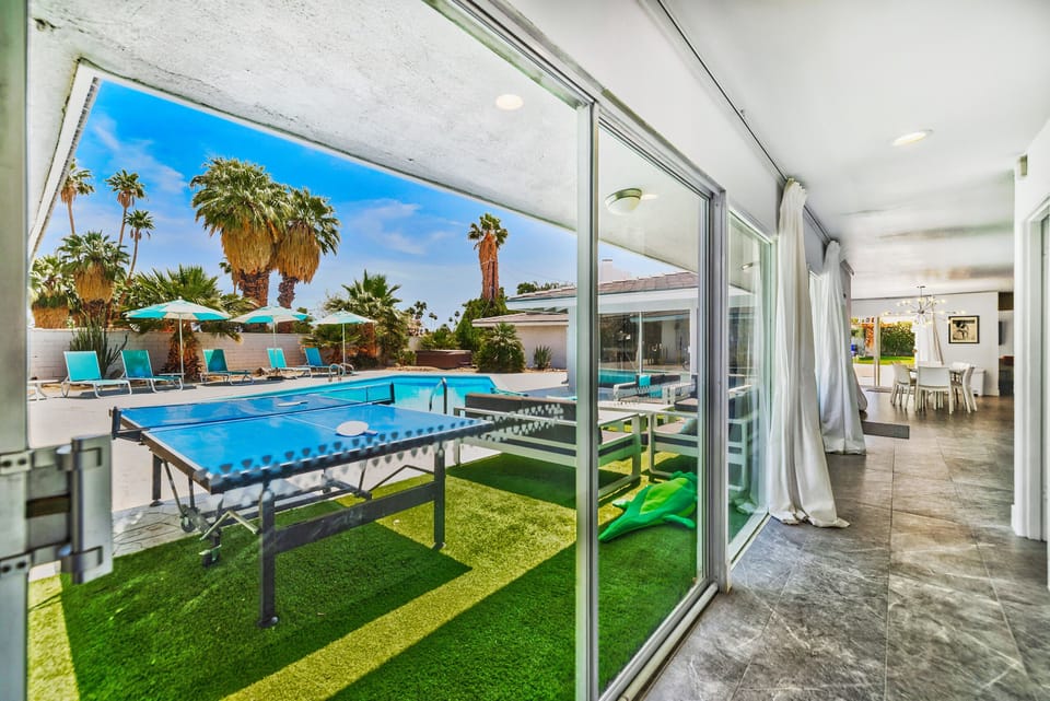 plenty of sliders for lots of light and views of the pool