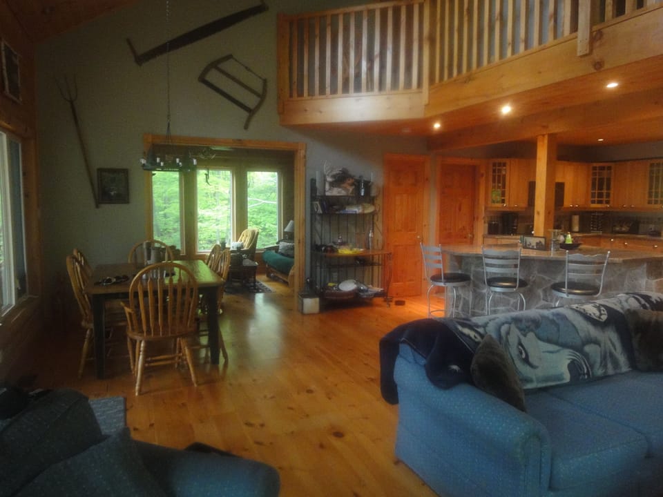 Dining Room overlooking Kitchen and separate Sun Room