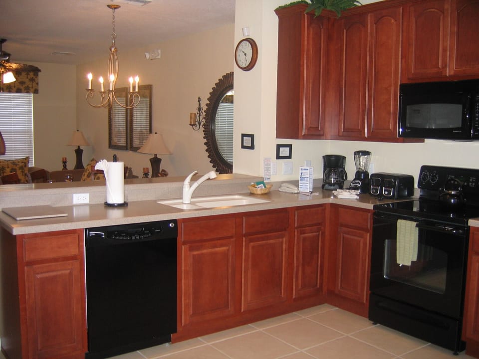 Modern, full size kitchen stocked with everything you need to whip up a meal.