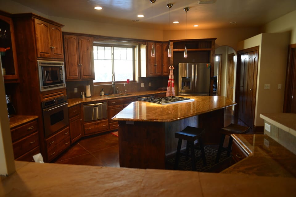 Two islands with barstools for quick meals and entertaining while you cook.