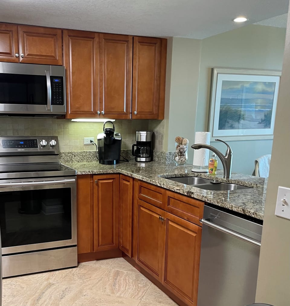 Kitchen is open to dining area.