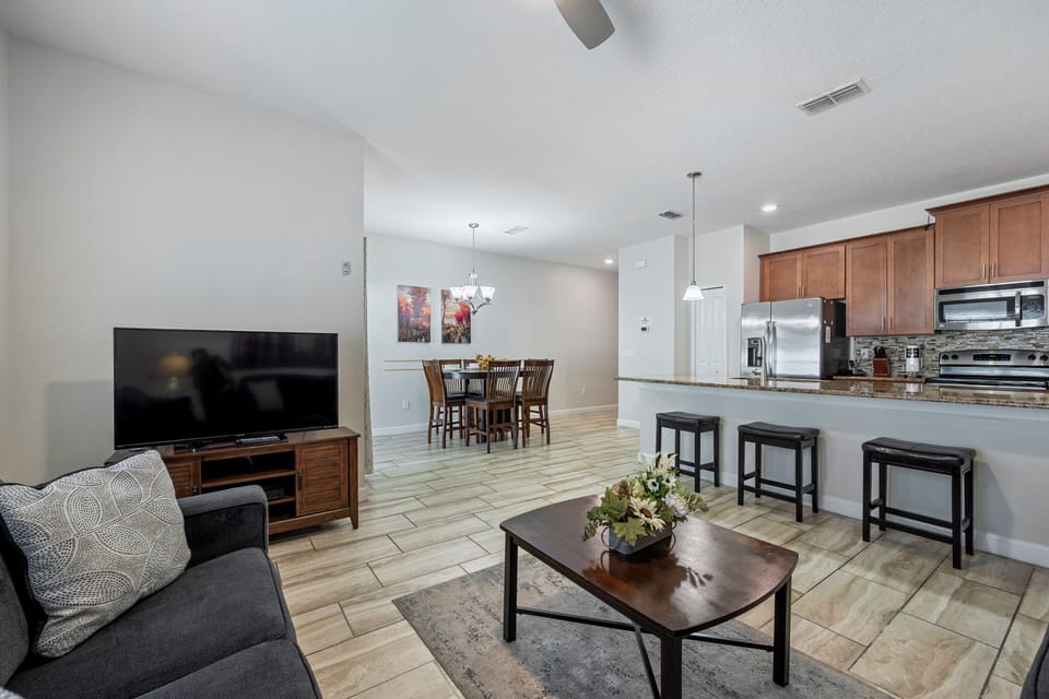 Spacious living room ideal for large gatherings and entertainment. 