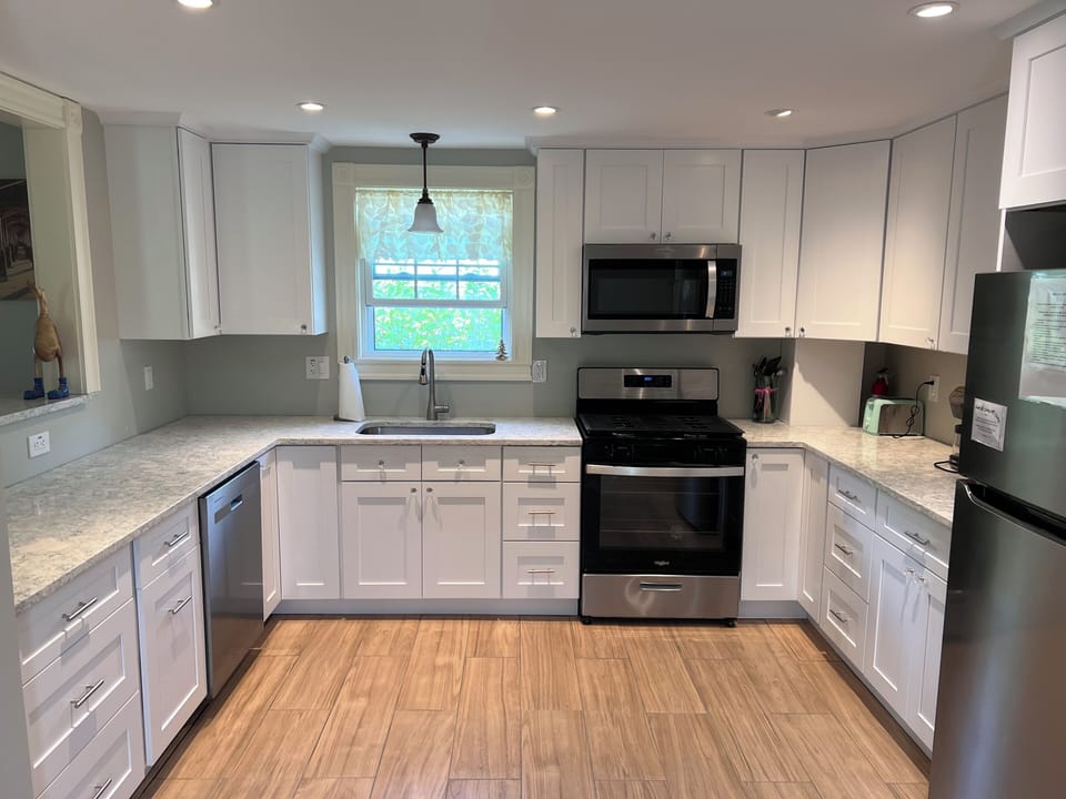 Brand new kitchen with Cambria Montgomery quartz.  Extra room for all your guest