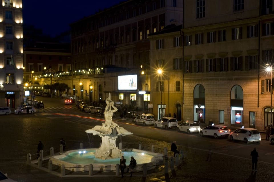 view from the window of the fountain of the Triton