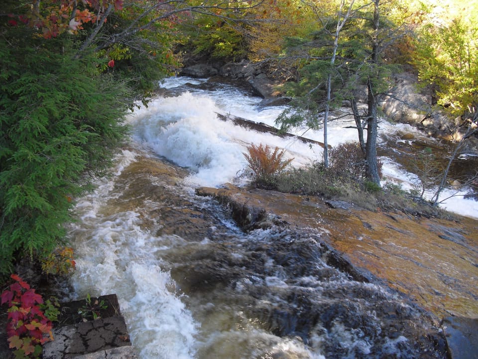 White-water kayaking nearby.