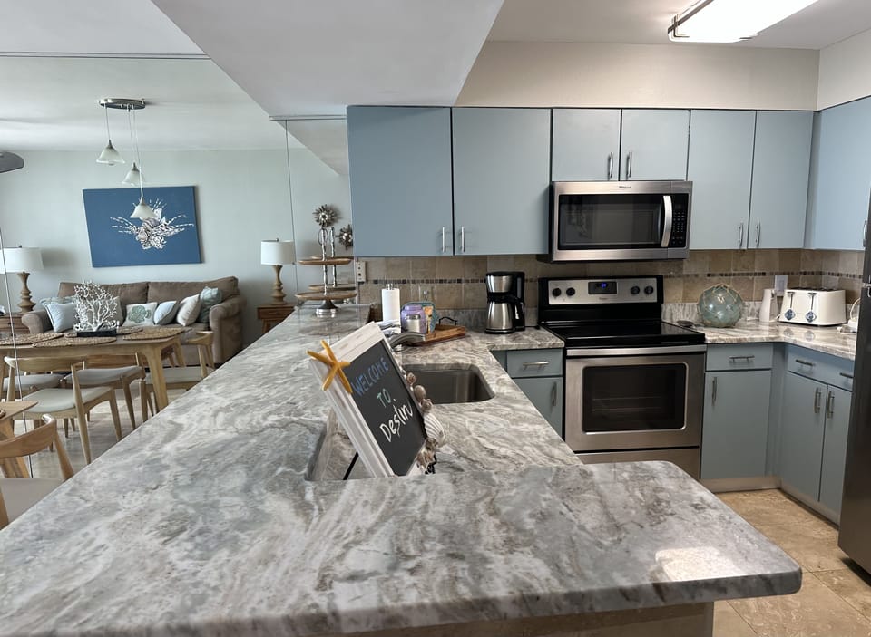 Italian granite counters, stainless steel appliances, essentials and much more