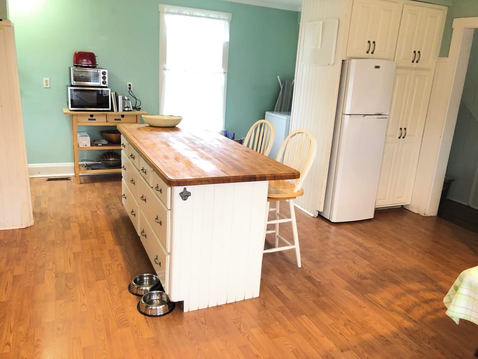 Second fridge in kitchen (we use for beverages).  Laundry in Kitchen
