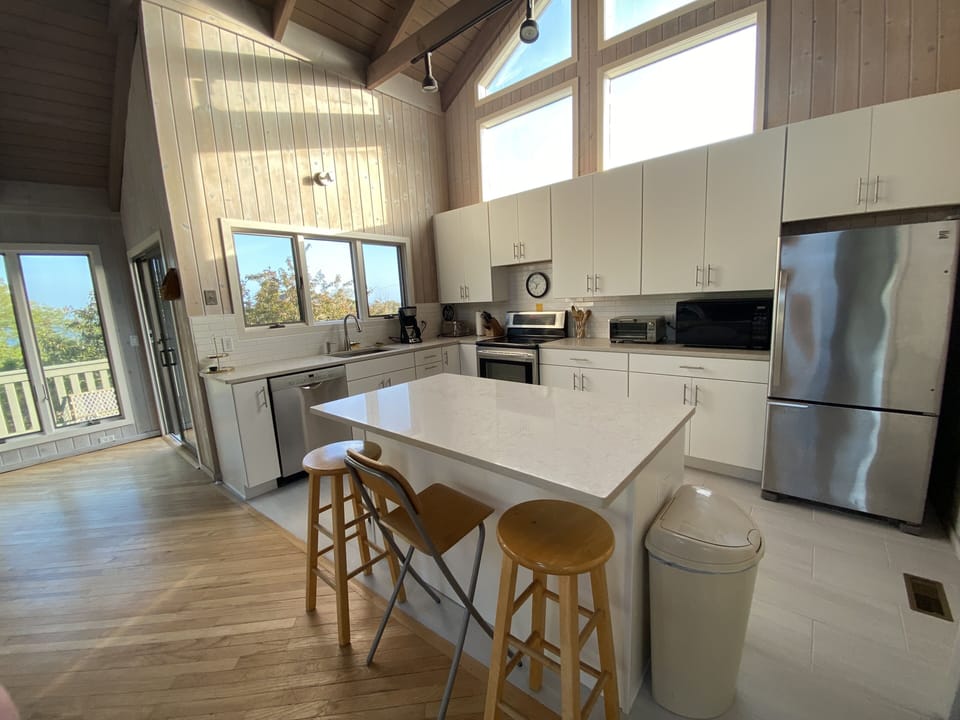 Kitchen Area Is Very Bright and Sunny, Like the Rest of Upstairs.
