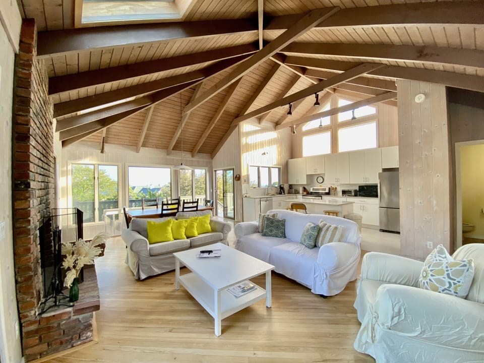 Upstairs Living, Dining, Entertaining, TV Area, with Convenient Half-Bathroom.