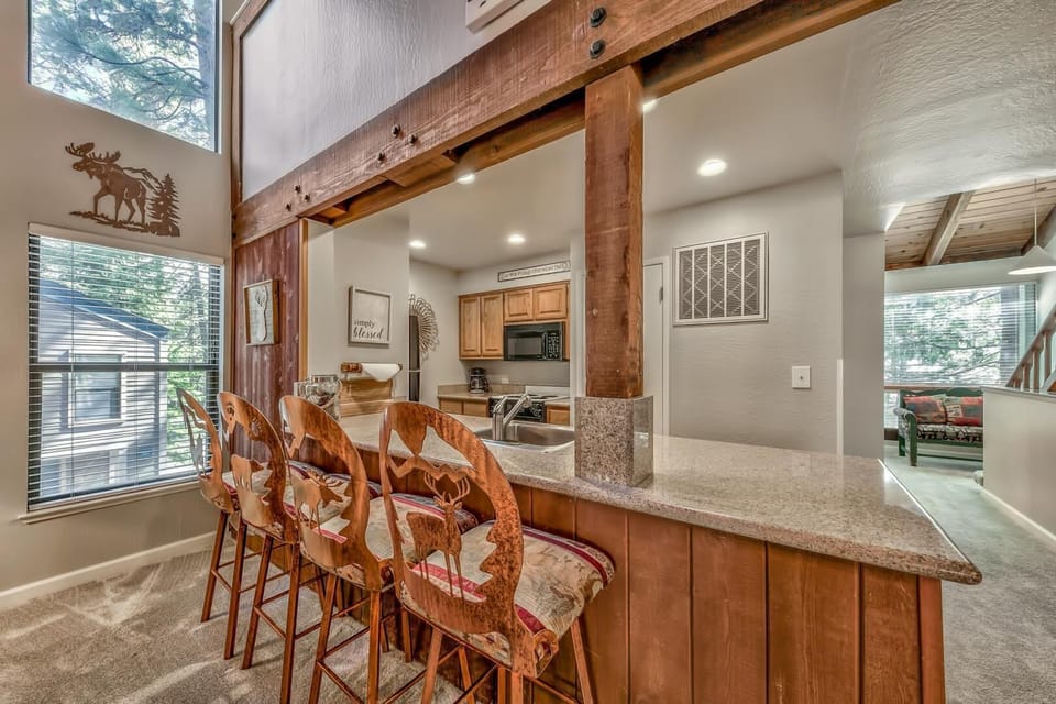 This open kitchen is perfect for the chef of the group with four bar stools along the counter for extra seating