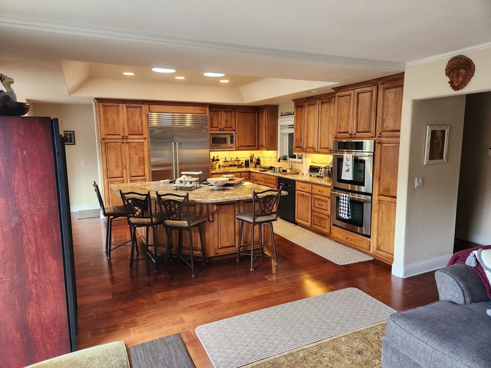 View of kitchen from sitting room. New Sub Zero