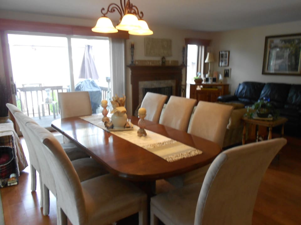 A formal dining room~for sit down meals...sliding doors on both sides ......