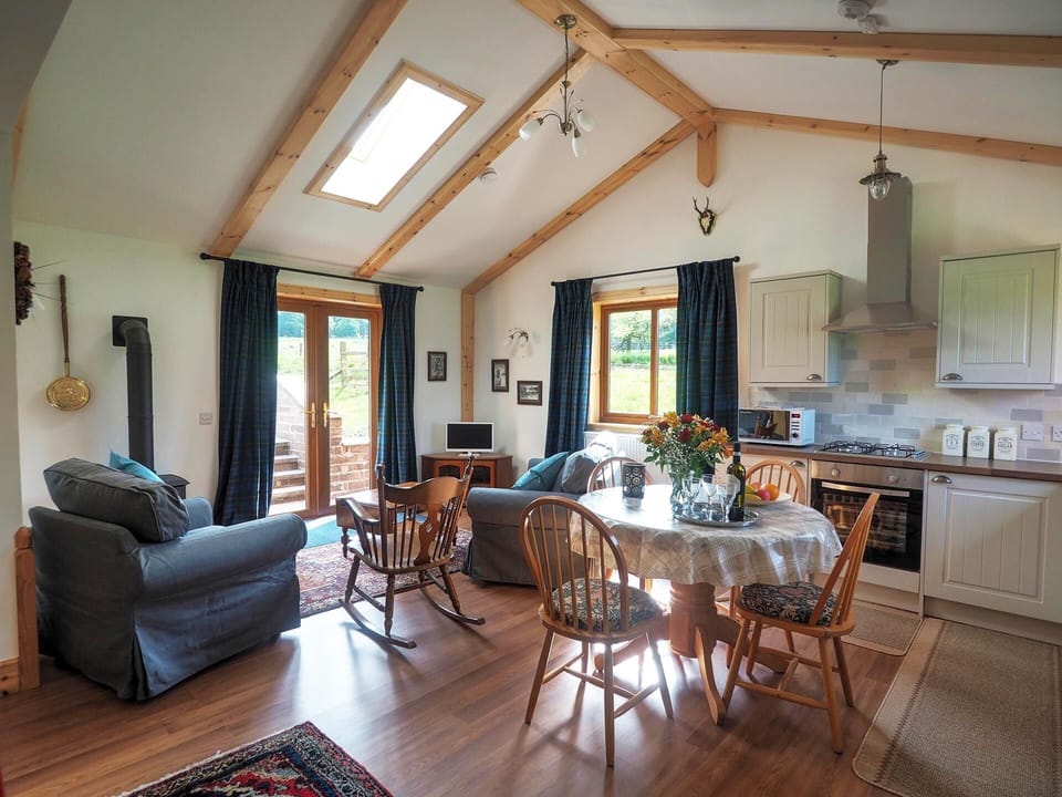 A large Livingroom /Kitchen/Dining Area