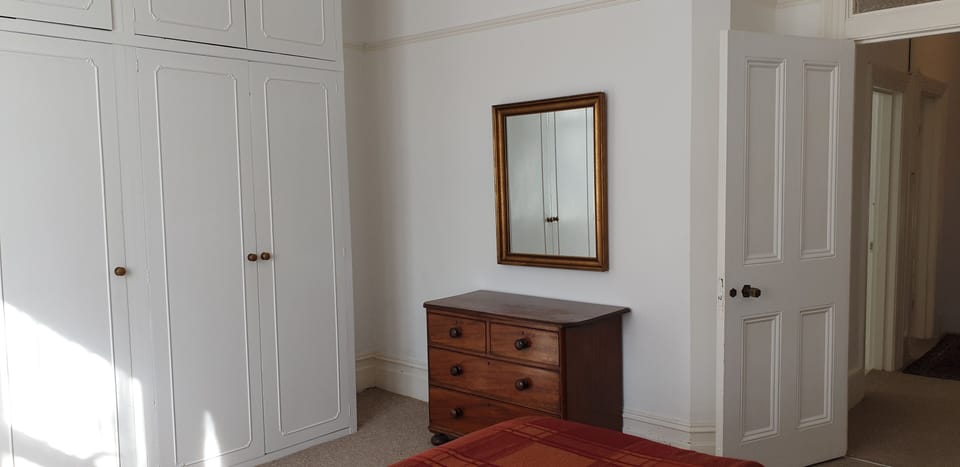 Putney apartment bedroom wardrobe and chest of drawers