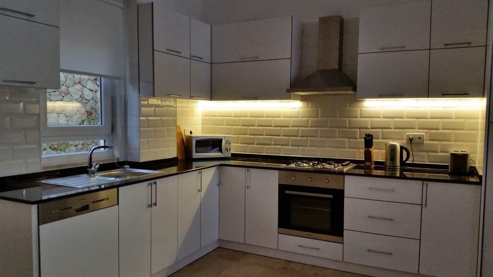 Fully equipped modern open plan kitchen
