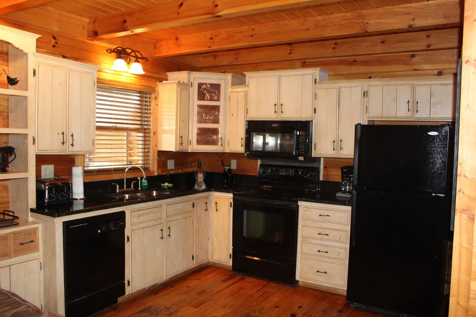Fully Furnished Kitchen with Granite Countertops