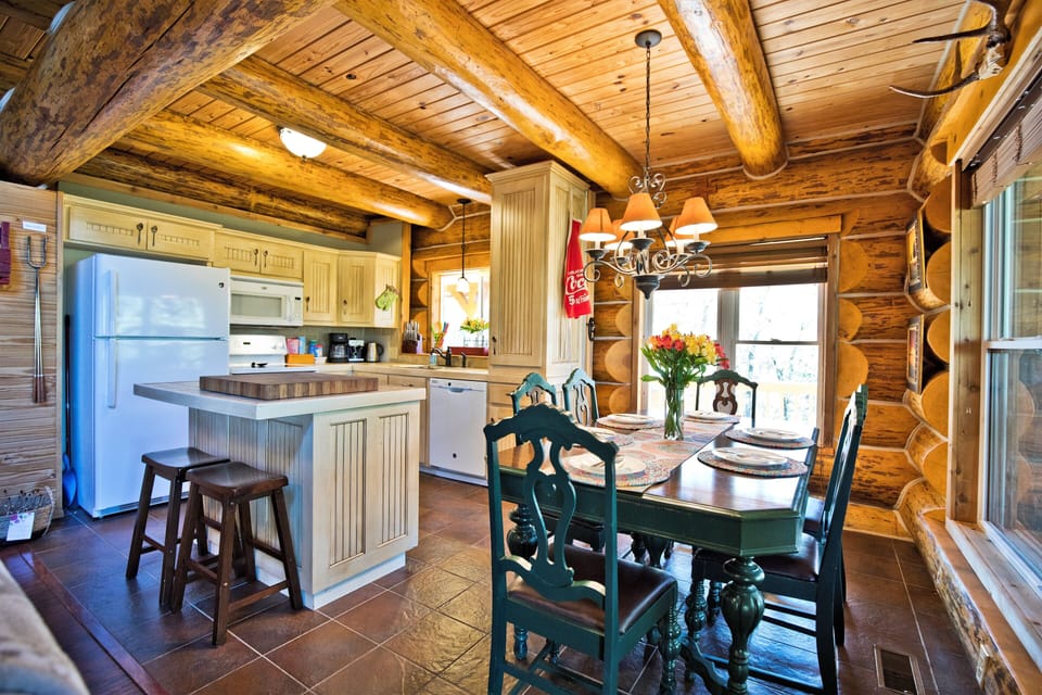 Ceiling interest adds a unique touch to the kitchen area.
