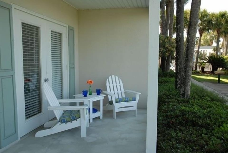 Patio, just a few steps from the pool (right)
