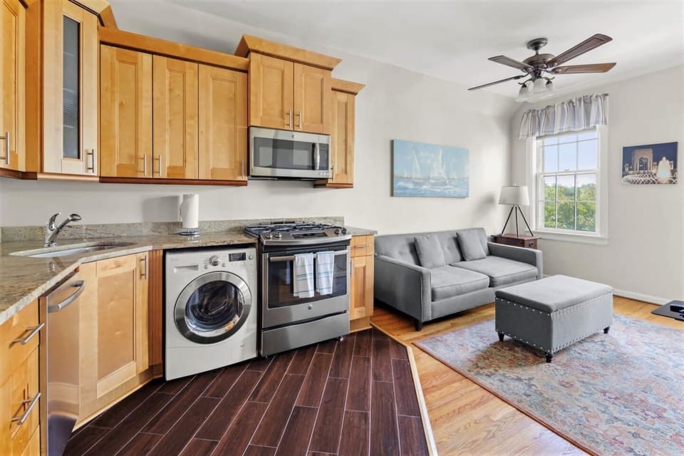 Living area and well appointed kitchen