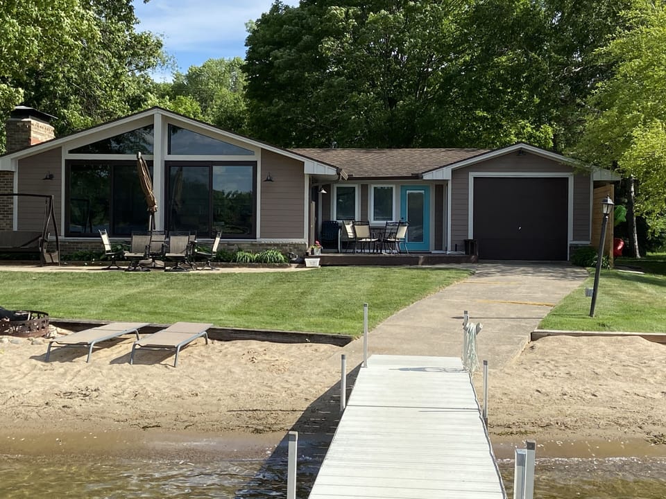 Sandy beach for playing or relaxing!  A firepit for night-time fun.