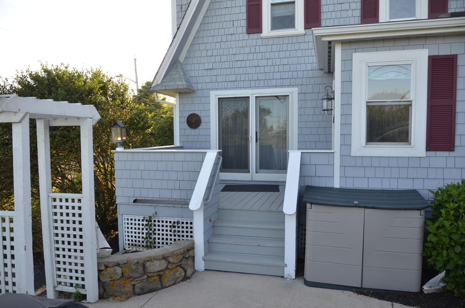 From patio towards porch and French doors from dining room.
