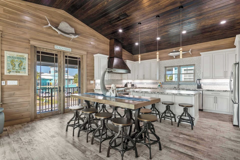 Open kitchen & dining space designed for gathering & easy conversation.