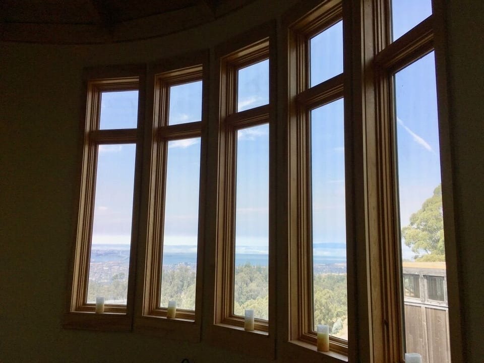 Windows above circular staircase from Master bedroom to Foyer