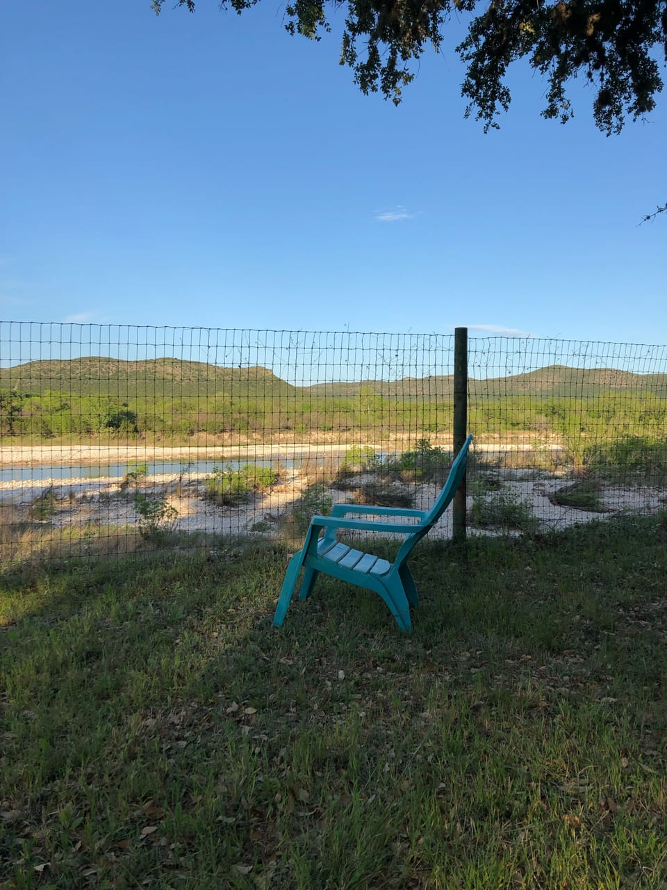 The Nueces River is just below the fence line with private access.