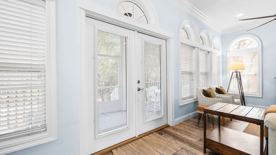 Step Outside to Tranquility via the Screened-In Porch